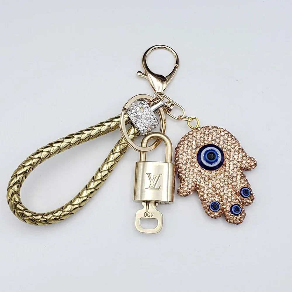 Authentic Louis Vuitton Lock & Key with unbranded Evil Eye Bagcharm 011526